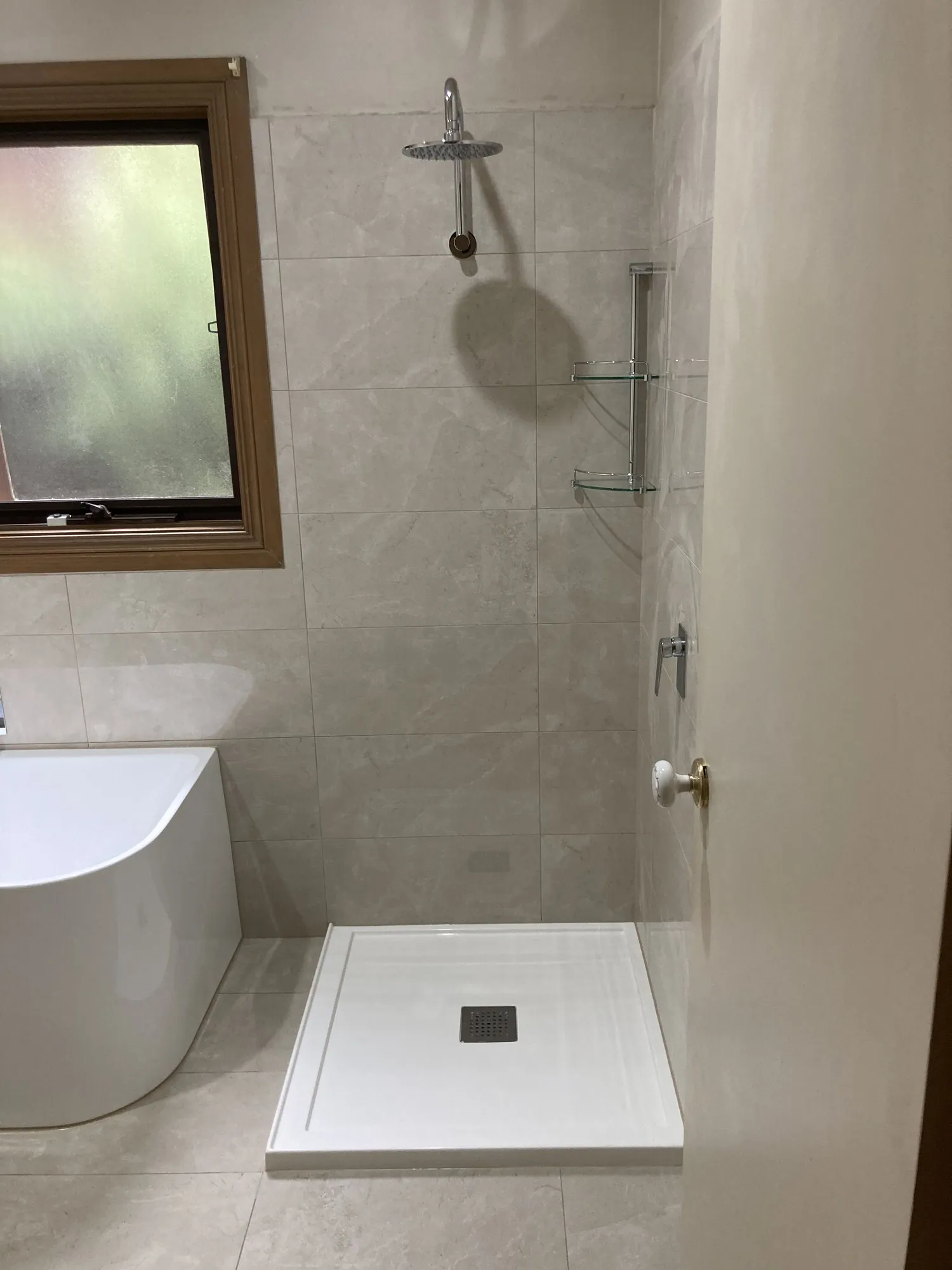 Completed bathroom renovation by Bathroom Renovators Group