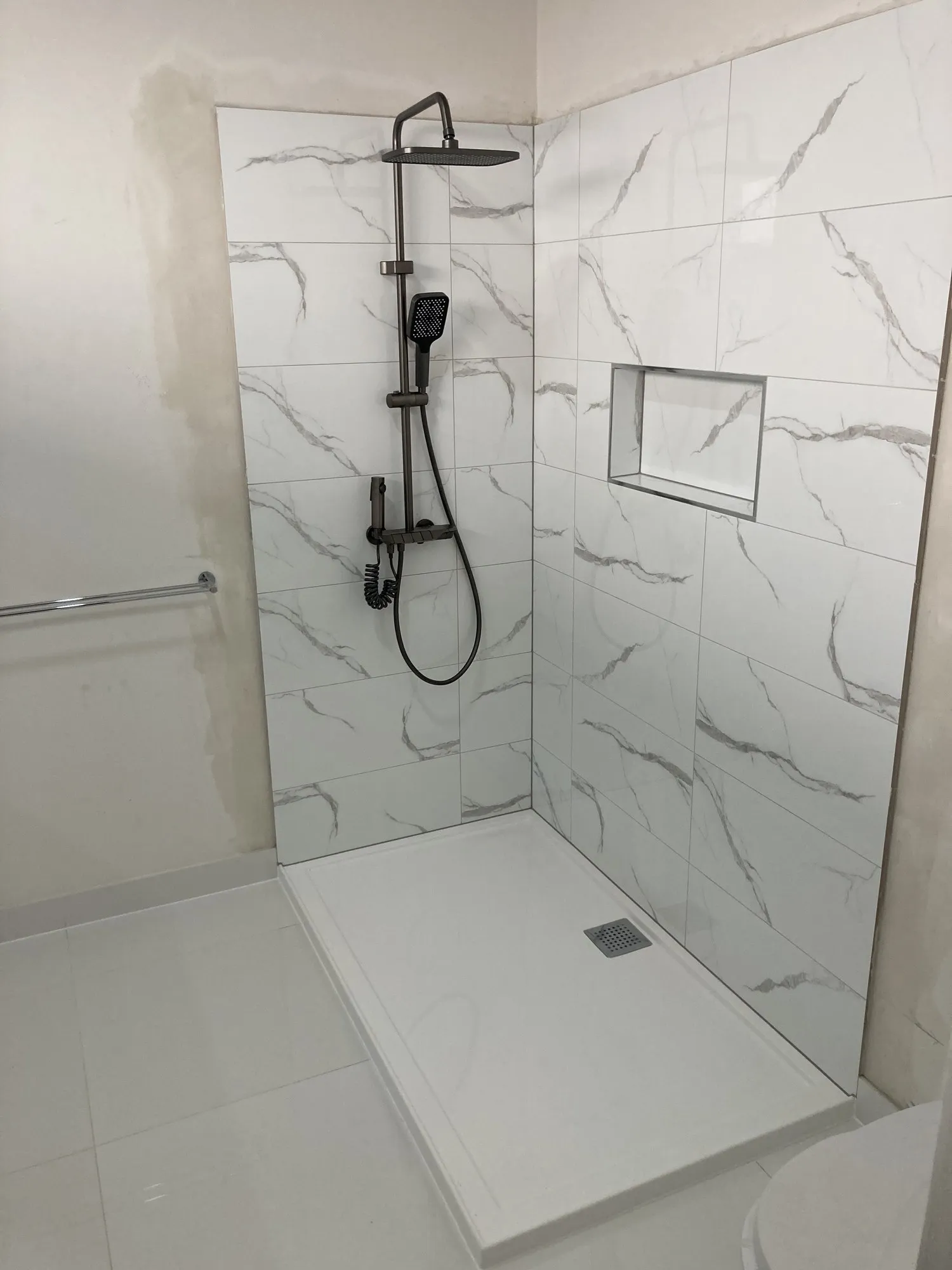 Completed bathroom renovation by Bathroom Renovators Group